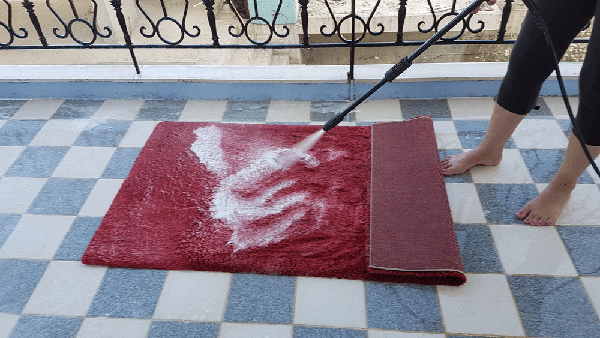 Using a power washer can make cleaning rugs an easy chore to do